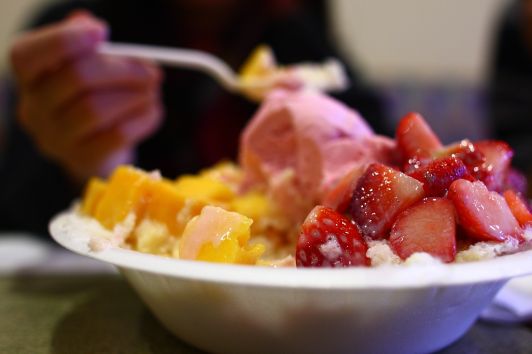 Juice Box's mango & strawberries, with strawberry ice cream over shaved ice and drizzled with condensed milk